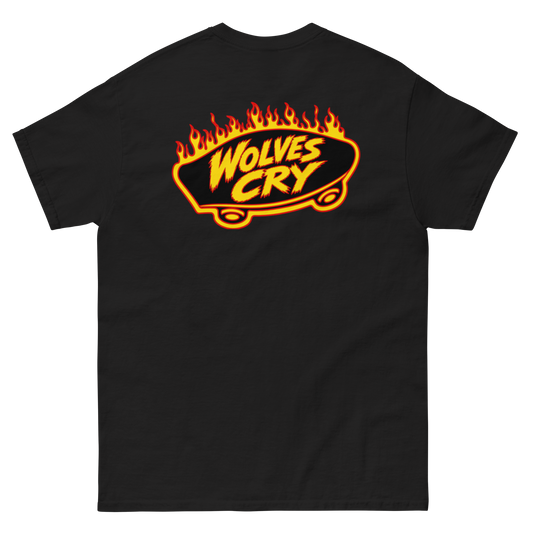 A black short-sleeve t-shirt with a large graphic on the chest featuring the words 'WOLVES CRY' in yellow over a flaming orange and yellow sign shape.