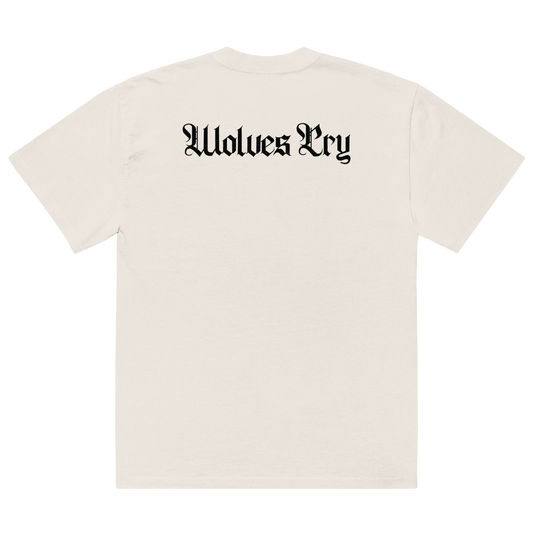 An off-white short-sleeve t-shirt shown from the back, featuring the text 'Wolves Cry' printed in a black Gothic font across the upper back.