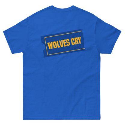 A royal Blockbuster movies tee shirt, 90s style, blue short-sleeve t-shirt shown from the back, featuring a graphic print of the word 'WOLVES CRY' in yellow text inside a dark blue and yellow outlined badge.
