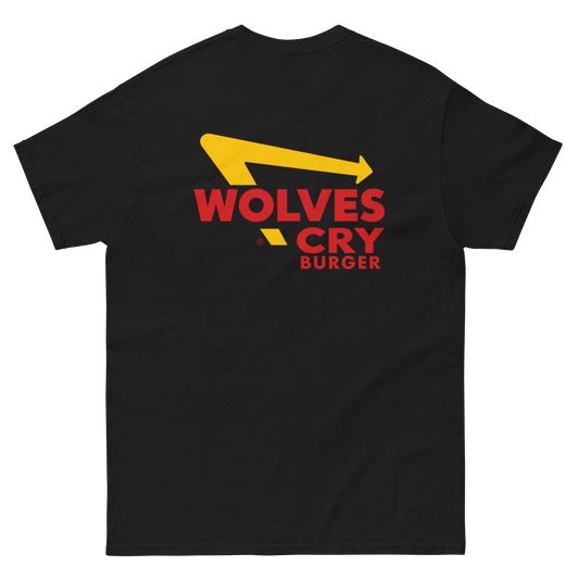 A black short-sleeve t-shirt with a graphic on the chest reading 'WOLVES CRY BURGER' in red, with a yellow arrow graphic above it, shown on a plain white background.