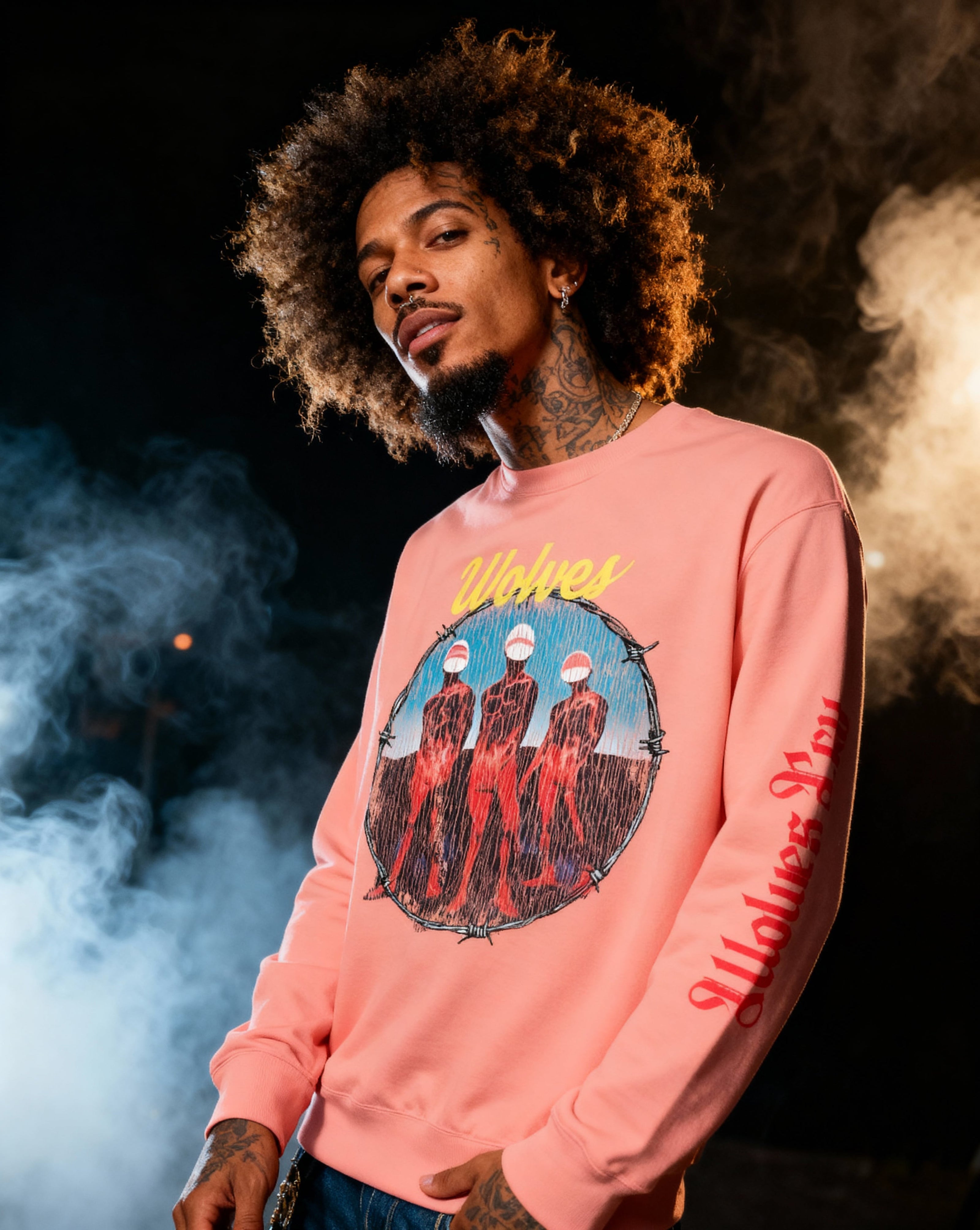 Model wearing coral wolves cry originals Crewneck with vintage-style graphic artwork, photographed against a smoky dark backdrop- bold, handcrafted streetwear energy
