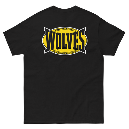 A black short-sleeve t-shirt shown flat against a white background, featuring a large graphic on the chest with the word 'WOLVES' in black over a yellow shape, plus smaller yellow and white text reading 'STREETWEAR THERAPY' and WORLDWIDE WESTSIDE