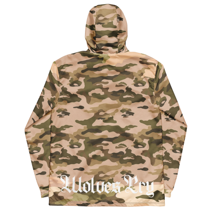 A hooded wolves cry originals windbreaker jacket with an all-over camouflage pattern in shades of tan, beige, brown, and olive green, shown from the back. A white Gothic-style text watermark reading , Wolves Cry' is printed across the lower back.