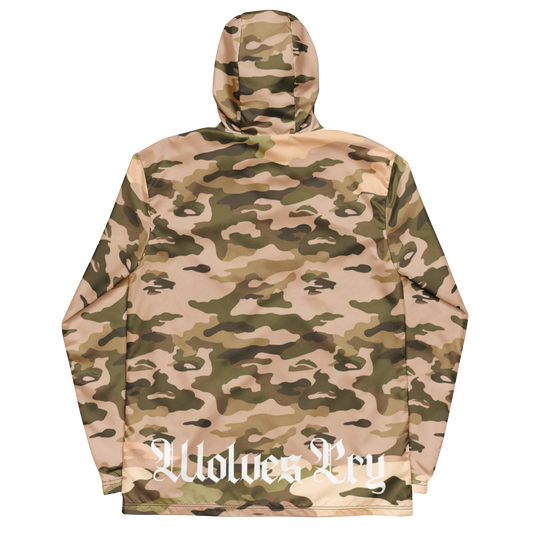 A hooded wolves cry originals windbreaker jacket with an all-over camouflage pattern in shades of tan, beige, brown, and olive green, shown from the back. A white Gothic-style text watermark reading , Wolves Cry' is printed across the lower back.