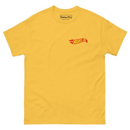 A yellow short-sleeve crewneck t-shirt featuring a small red and yellow 'wolvea cry hot wheels tee shirt.' logo on the left chest, displayed on a clean white background. 90s style nostalgia tee