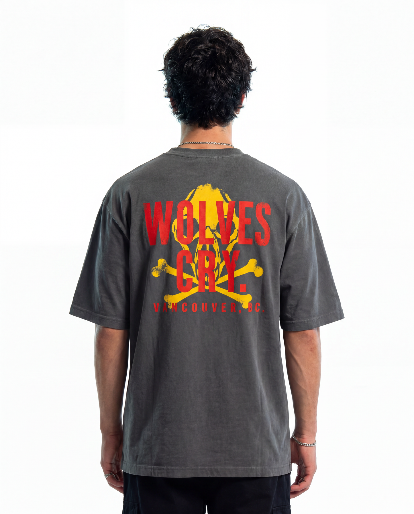 Back view of vintage black Wolves cry tee shirt , woles skull and wolves cry wordmark logo 
